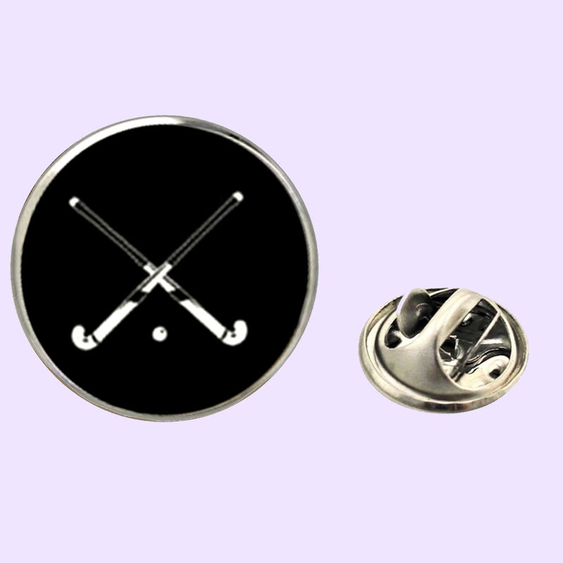 Bassin and Brown Crossed Hockey Sticks Lapel Pin - Black and White