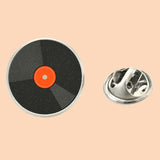 Bassin and Brown Vinyl Disc Lapel Pin - Orange.Black