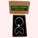 Bassin and Brown Crossed Hockey Sticks Keyring - Black and White